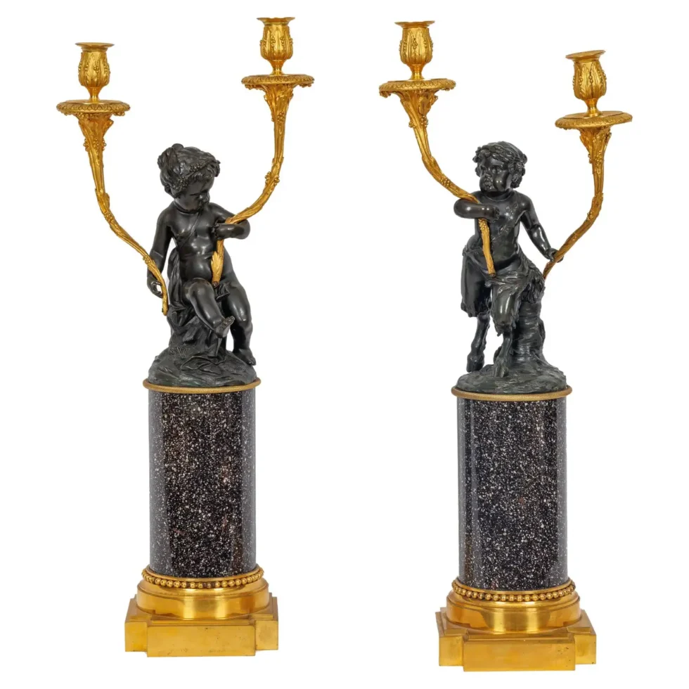 A Magnificent Pair of Louis XVI Style Gilt Bronze Candelabra on Porphyry Bases